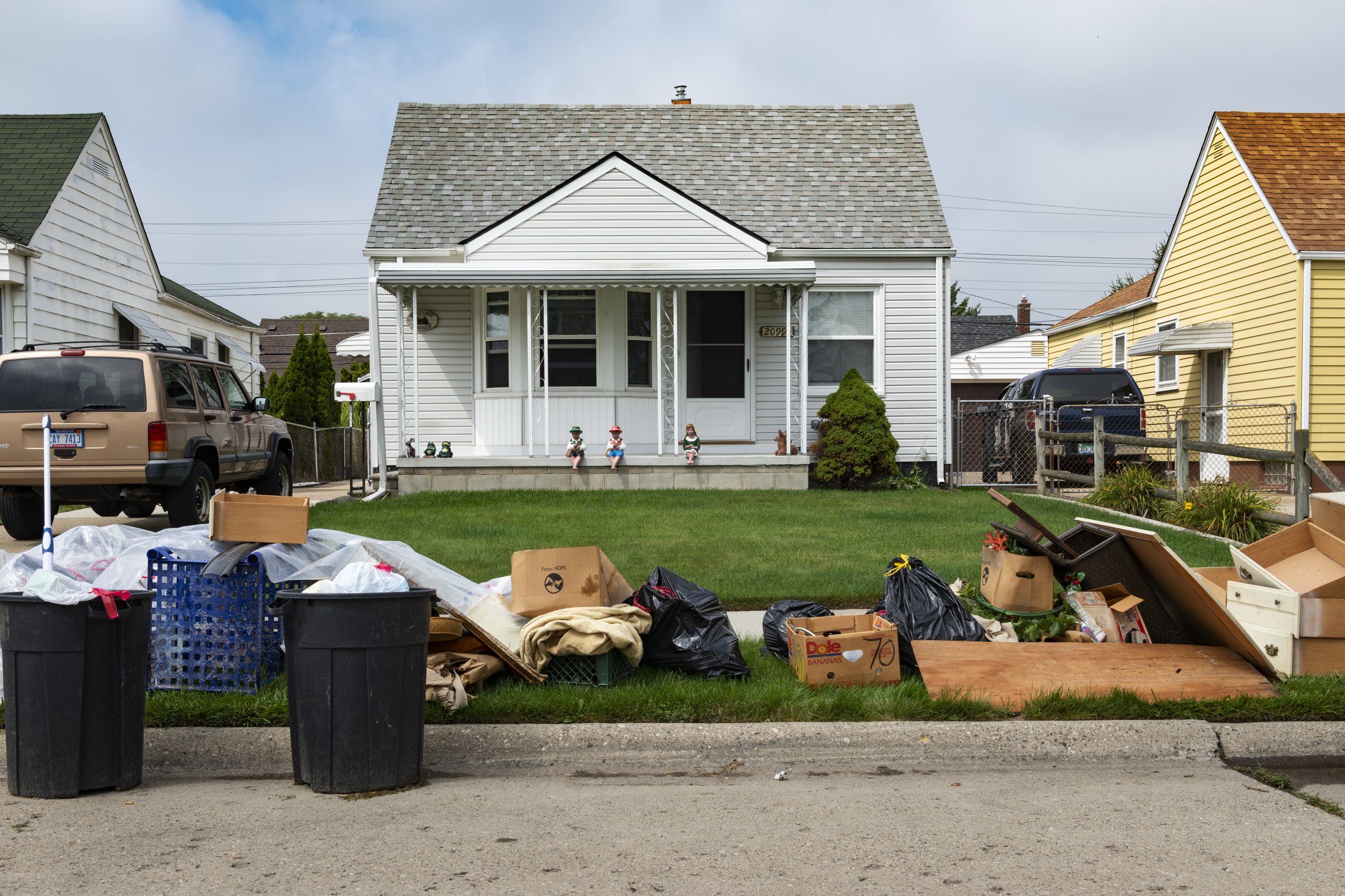 An evicted house at a suburban street with left belongings on the lawns near the 8 mile road, in the city of Detroit.
