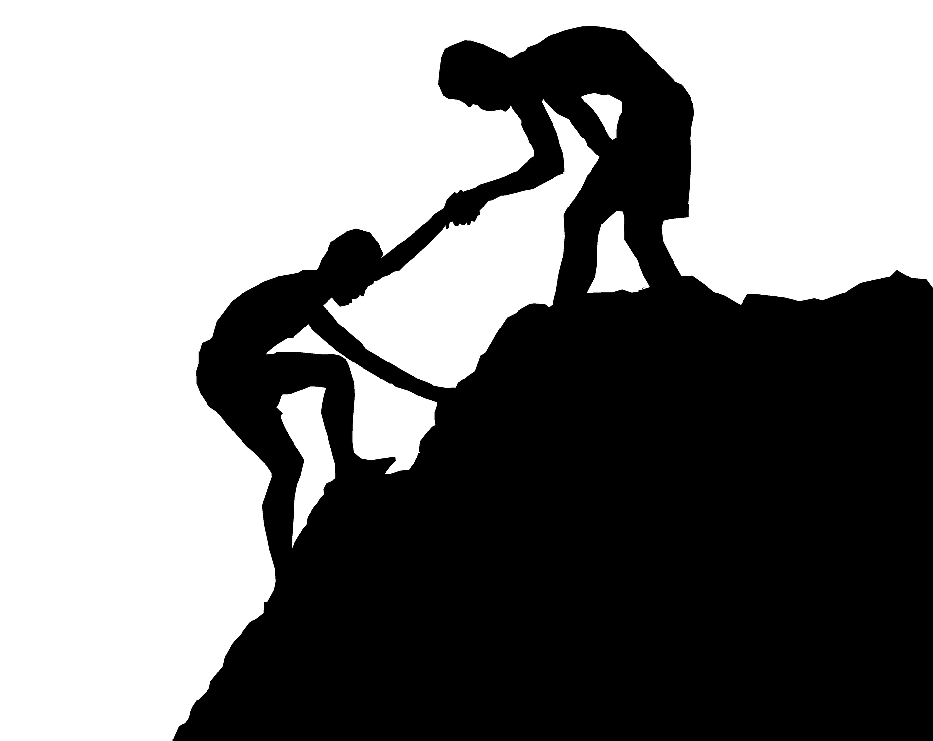 Silhouette of One Person Helping another Climb Steep Hill