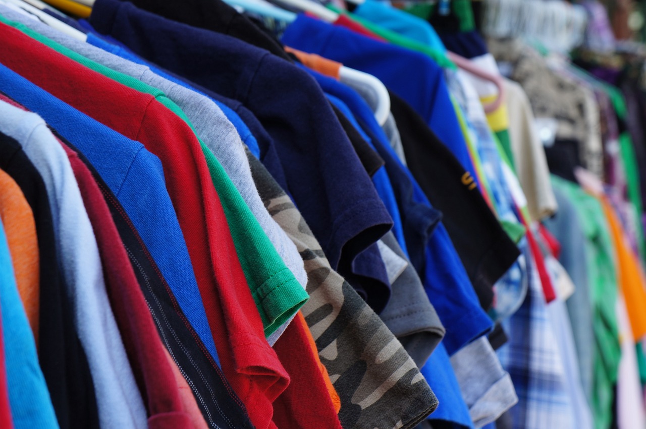 Rack of Old Clothing on Hangars