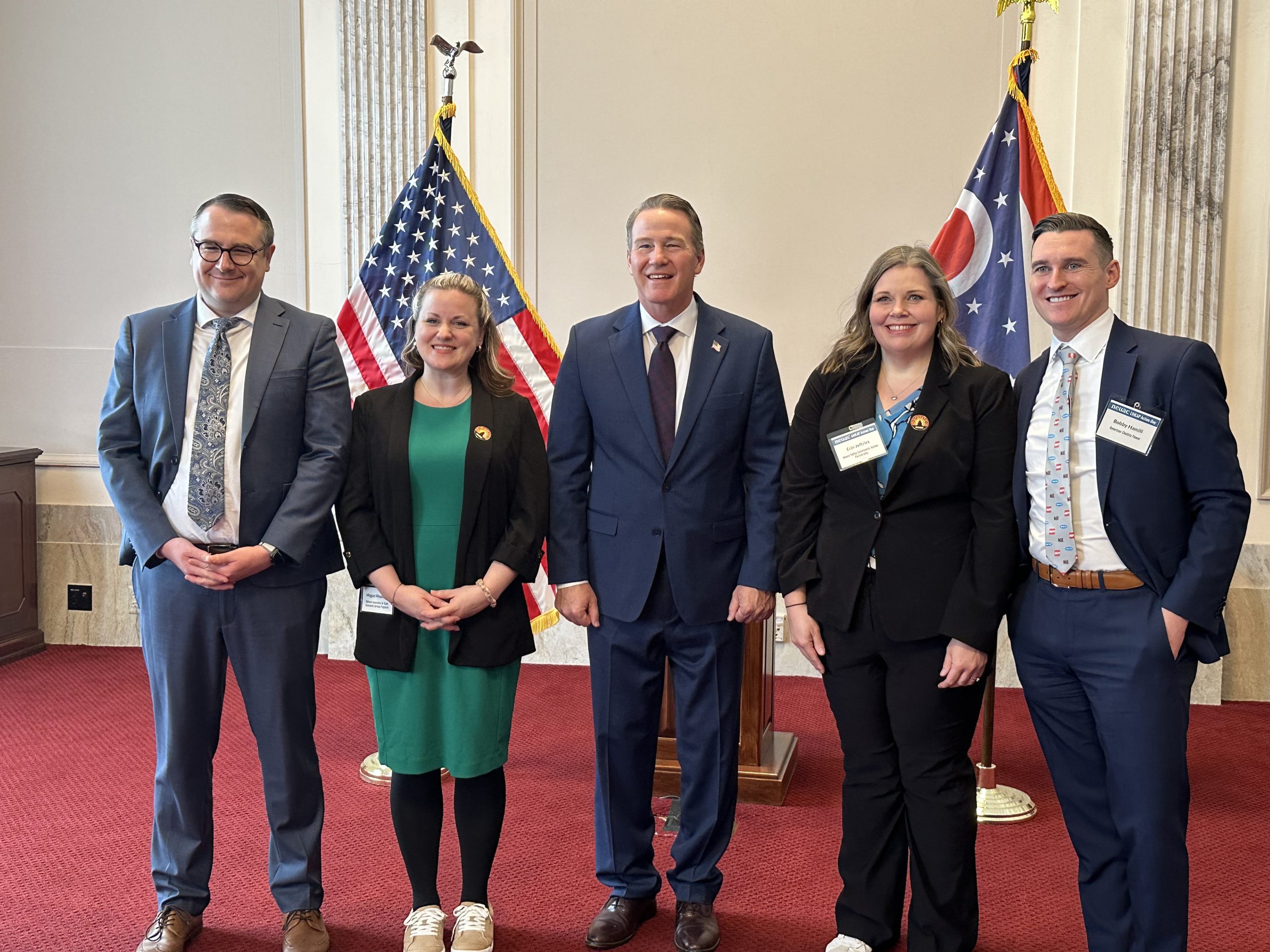 Group of People Standing with Flags