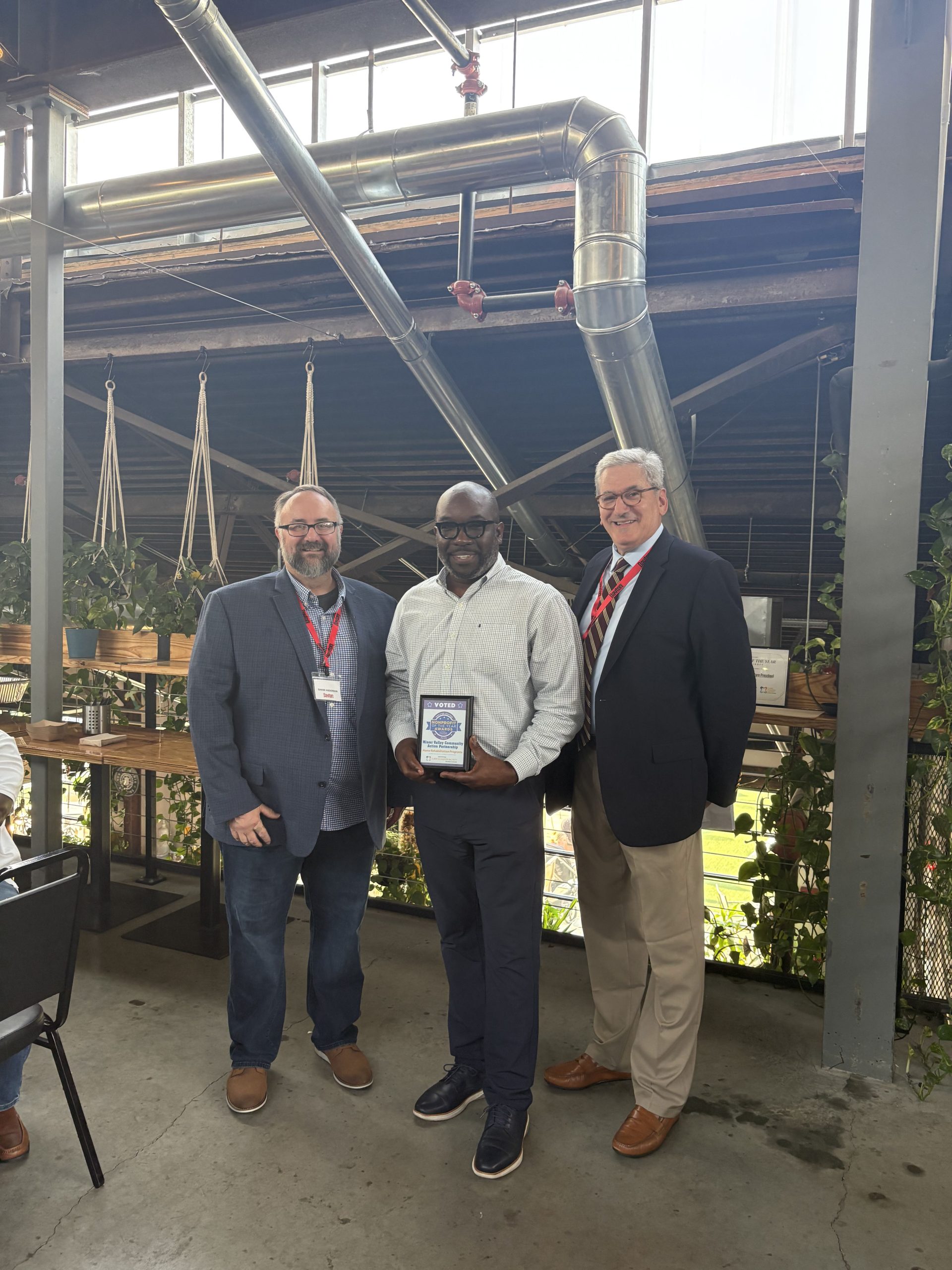 MVCAP's Eddie Cooper accepts the Non-Profit of the year award from Dayton Magazine